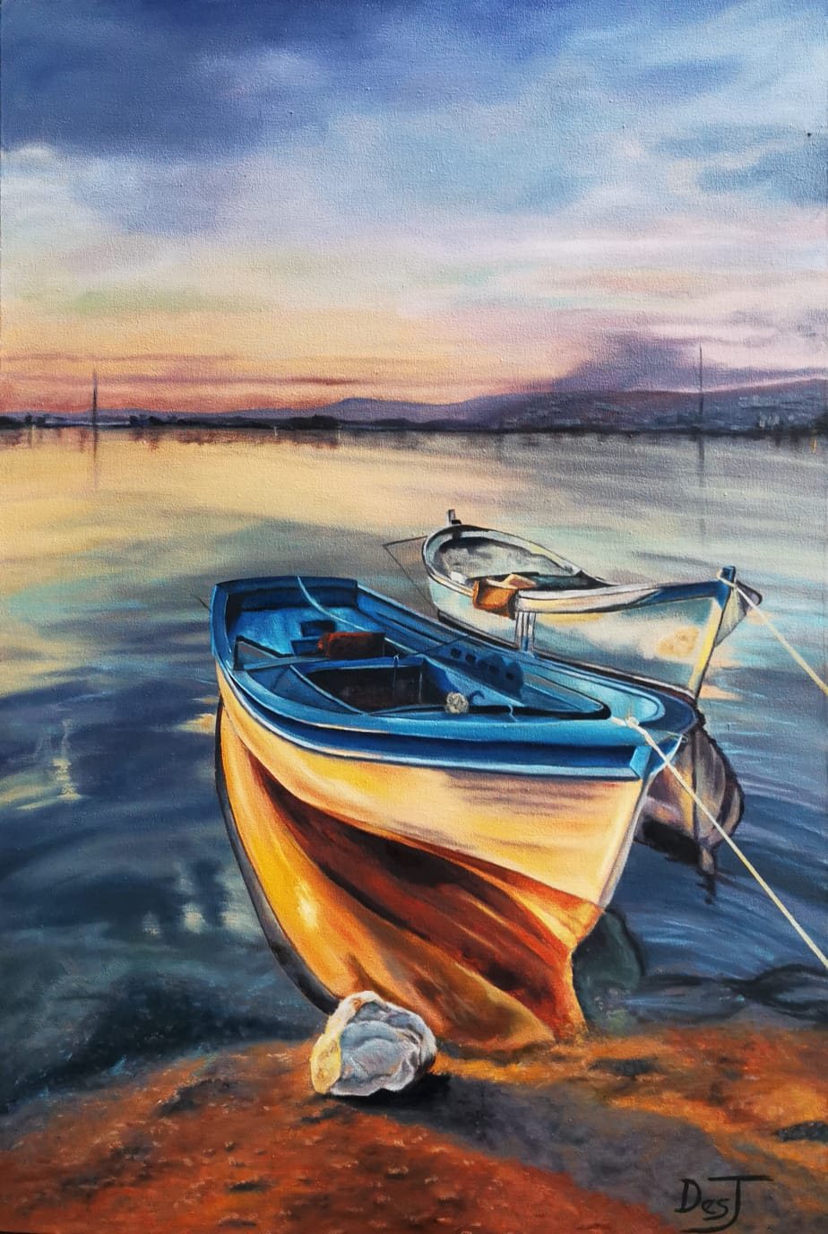 Two small boats at sunset