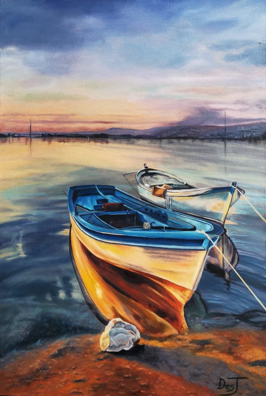 Two small boats at sunset