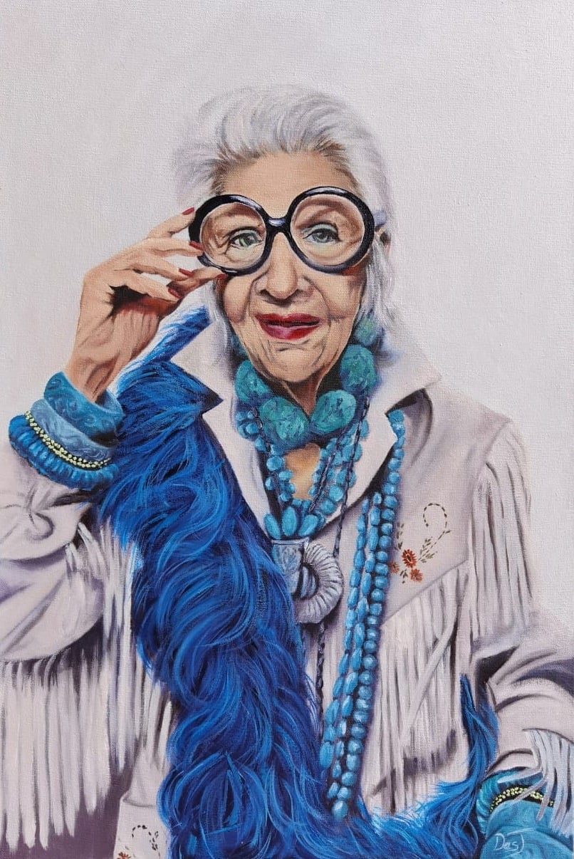 Oil painting depicting portrait in a blue feathered coat by South African artist Des Green.
