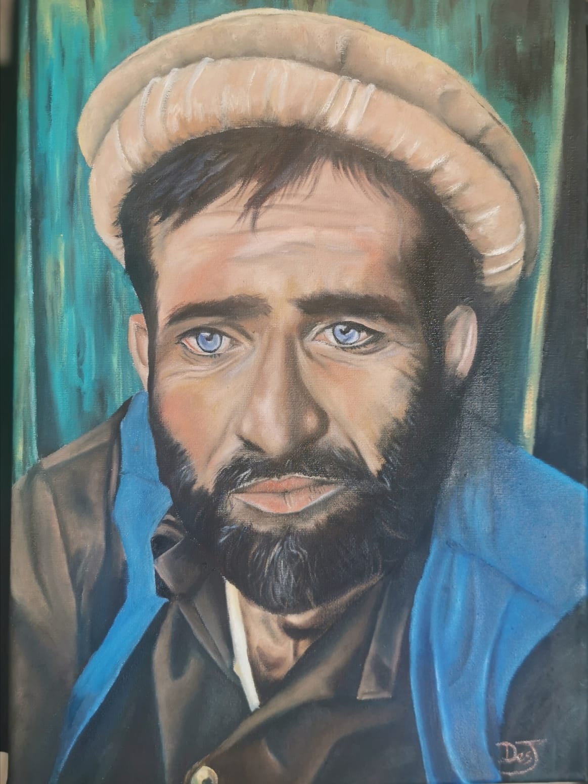 Oil painting depicting blue-eyed man in a pakol hat by South African artist Des Green.