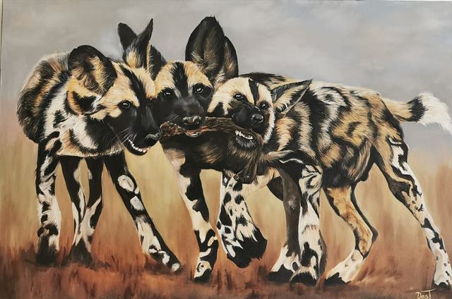 Oil painting depicting wild dog pack by South African artist Des Green.